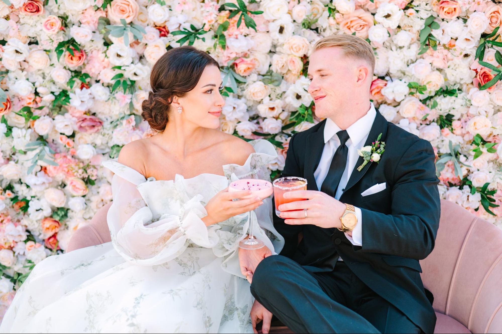 bride and groom at cocktail hour for winter wedding in santa fe