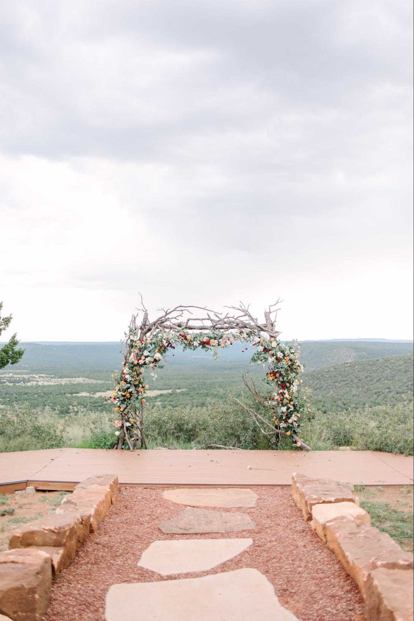 stunning ceremony arch for at destination wedding venue in santa fe