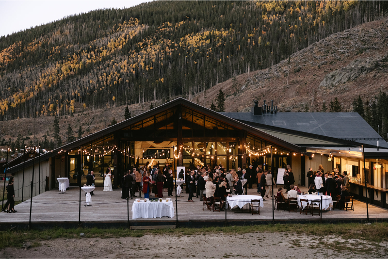 Guest following wedding dress codes enjoy cocktail hour in Taos.