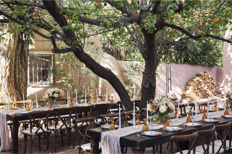Butter yellow wedding decor on tables.