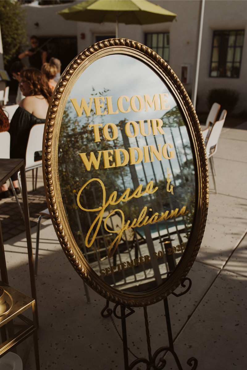 Custom mirror signage ceremony decor for fall wedding in New Mexico.