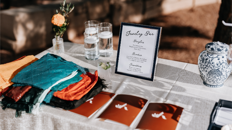 Jewelry making station set up for wedding rehearsal dinner.