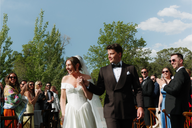 Bride and groom exit together after unplugged ceremony.