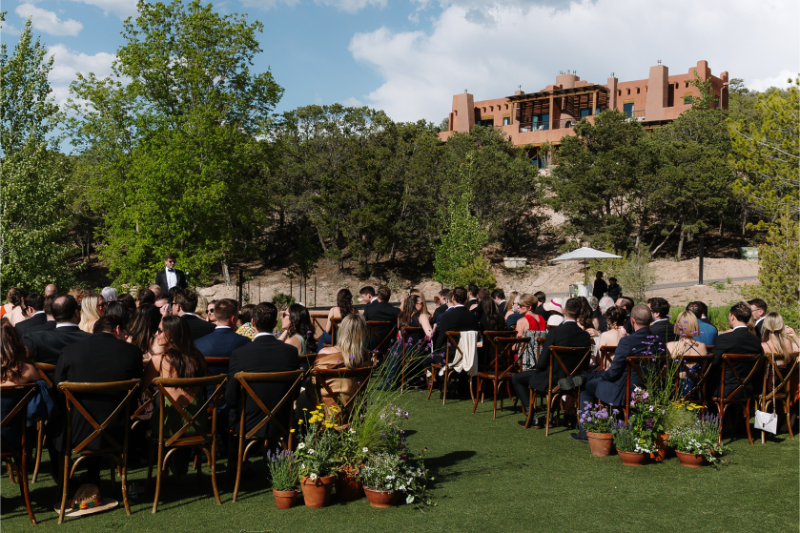 Photographer captures guests seated and ready for unplugged ceremony in New Mexico.