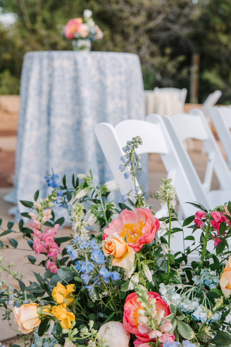 Floral arrangement for wedding ceremony aisle.