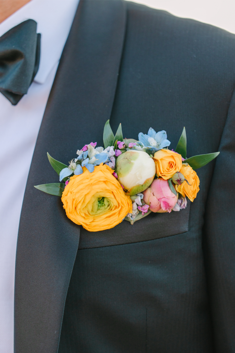 Colorful pocket boutonniere for wedding.