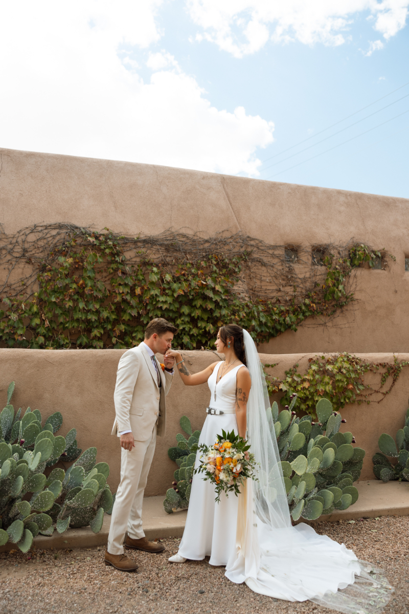 Bride and groom share first look outside of The Desert Compass, one of the best places to get married in New Mexico.