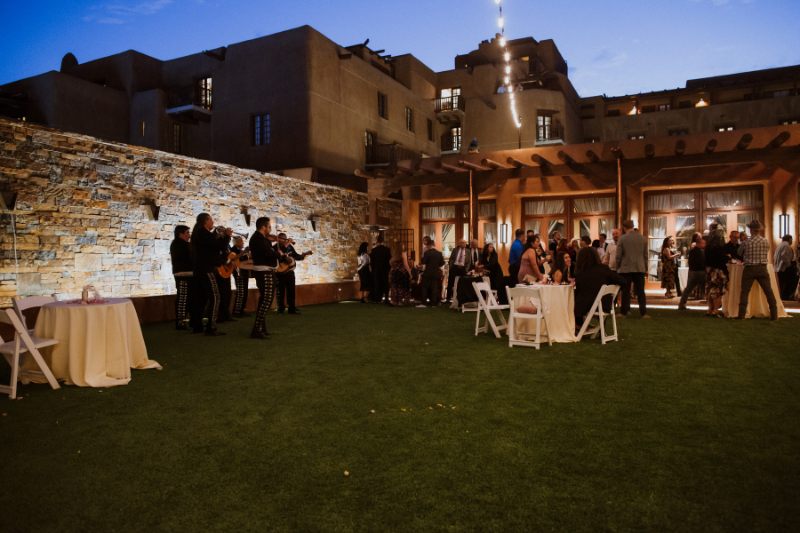 The lawn lit up at night for cocktail hour during wedding reception at the Inn and Spa at Loretto.