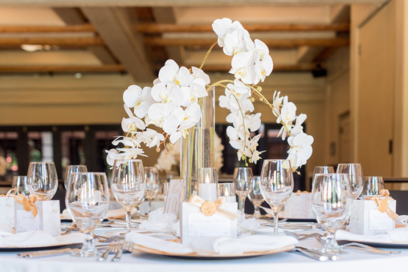 White floral centerpiece for wedding.