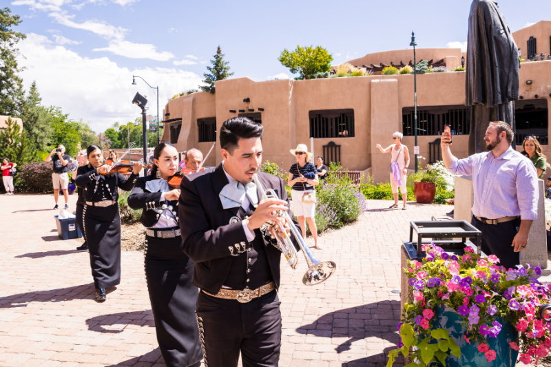 Mariachi band leads guests from the ceremony to cocktail hour at the Inn and Spa of Loretto.