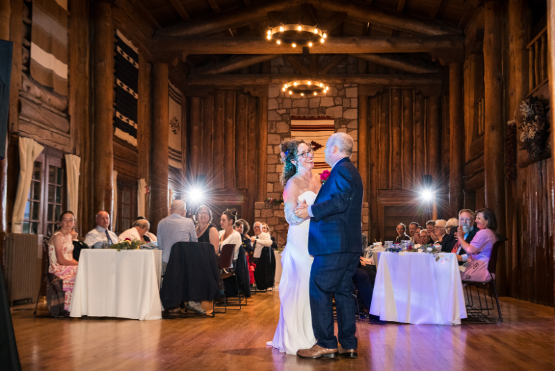 Bride and groom share first dance during their intimate wedding reception in New Mexico.