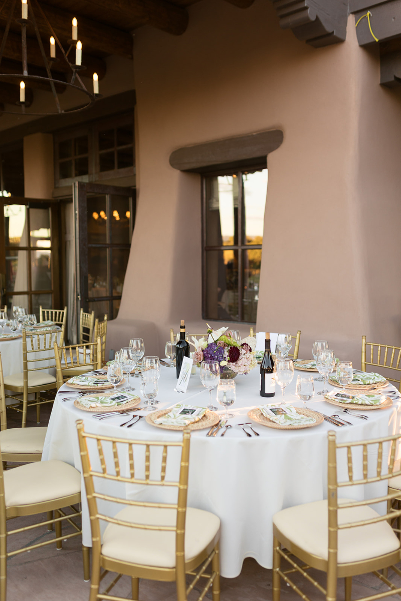 Decorated tablescape with gold details for Santa Fe weddings.