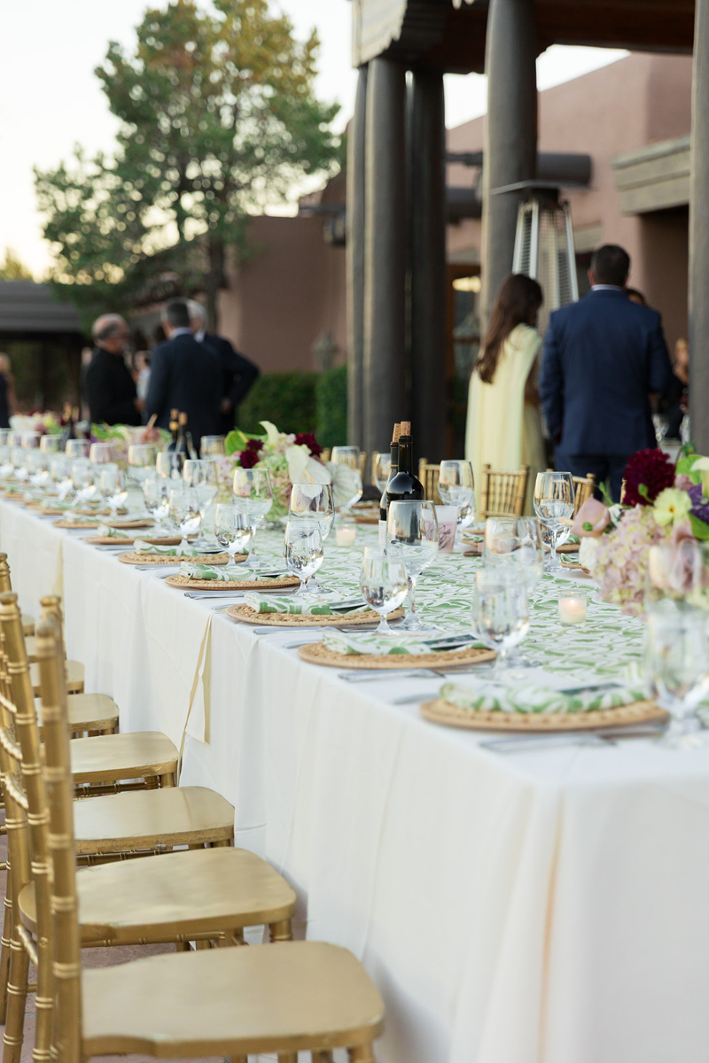 Decorated tablescape with gold details for Santa Fe weddings.