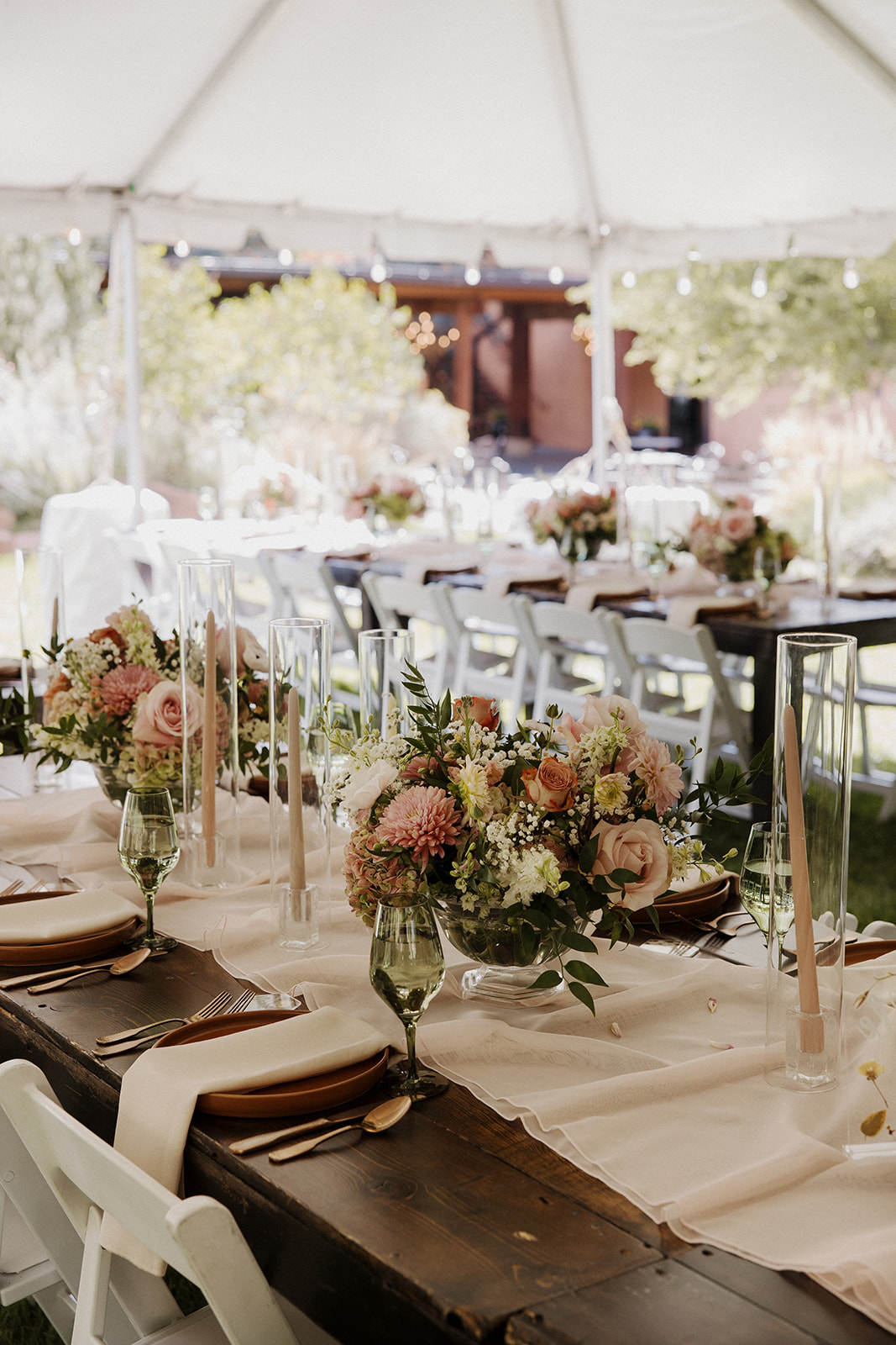 Reception tablescape decorated with shades of green and pink details for a Tennessee mountain wedding.