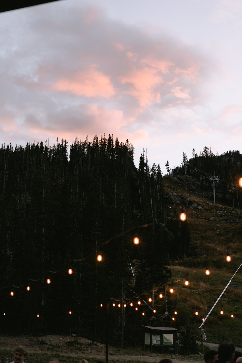 Sunset over this Knoxville wedding venues cocktail hour under string lights.