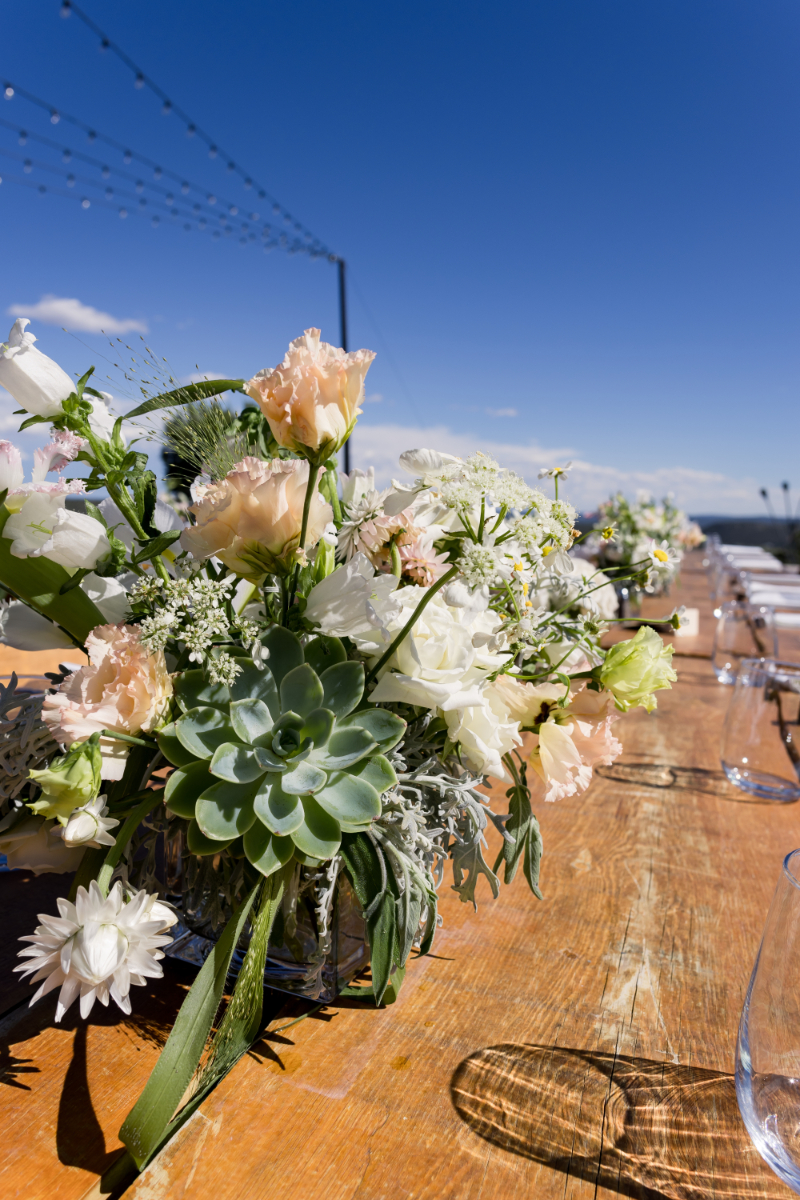 Detail shot of floral centerpiece for wedding reception table in New Mexico.