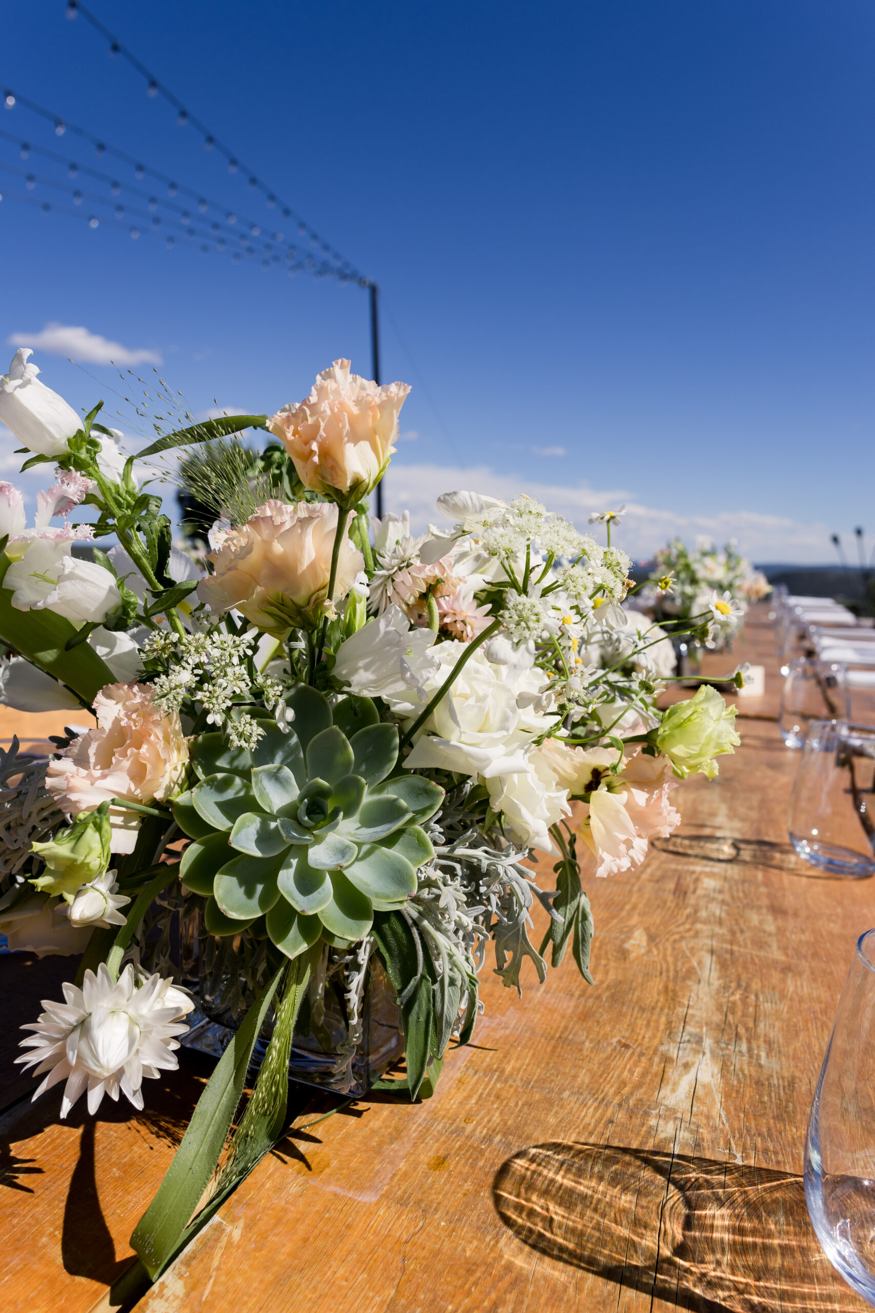 Up close photo of wildflower centerpiece for an elevated country wedding.