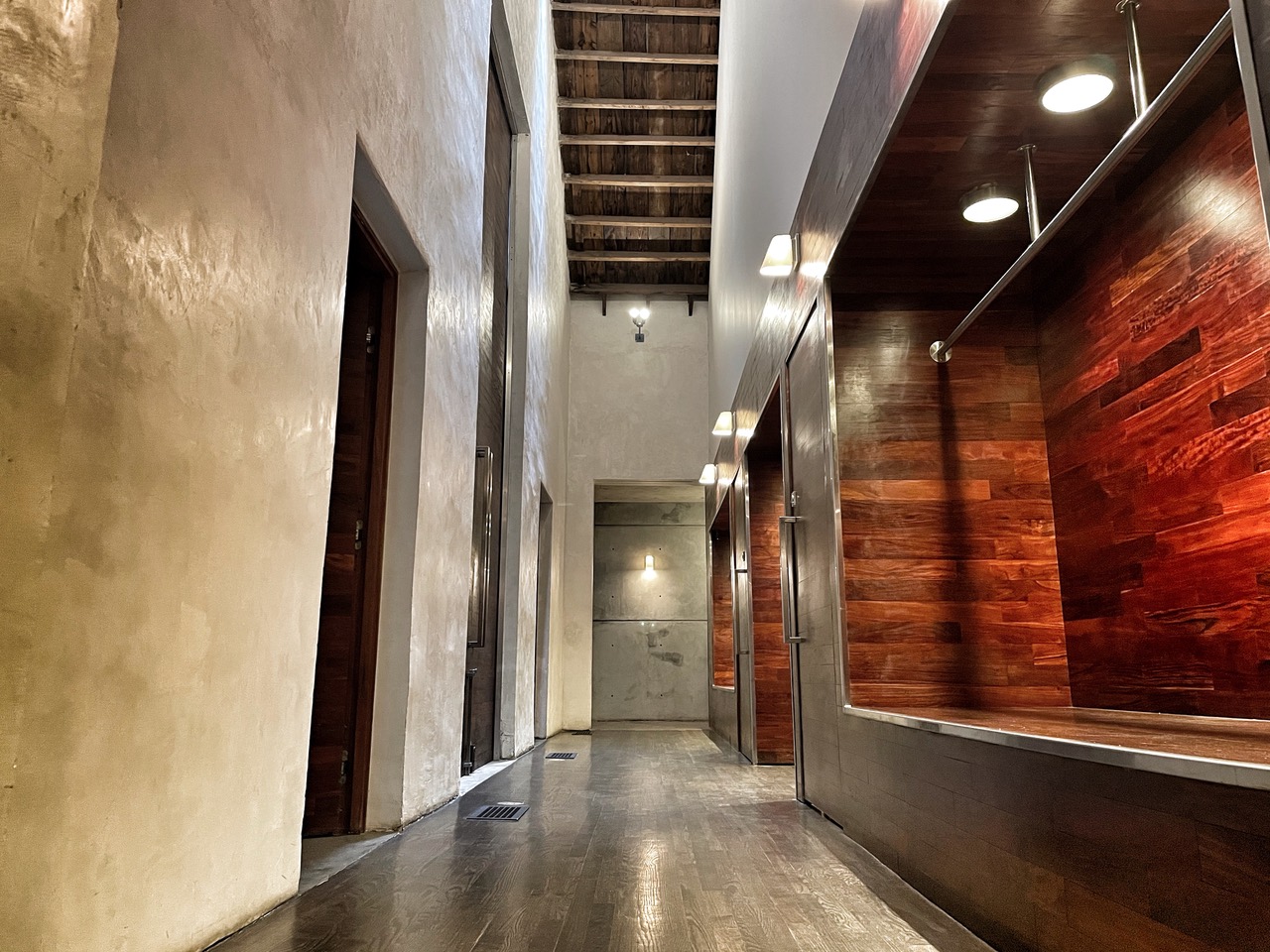 Entrance of the Ruby room in Nashville, with modern wood and stone architecture.
